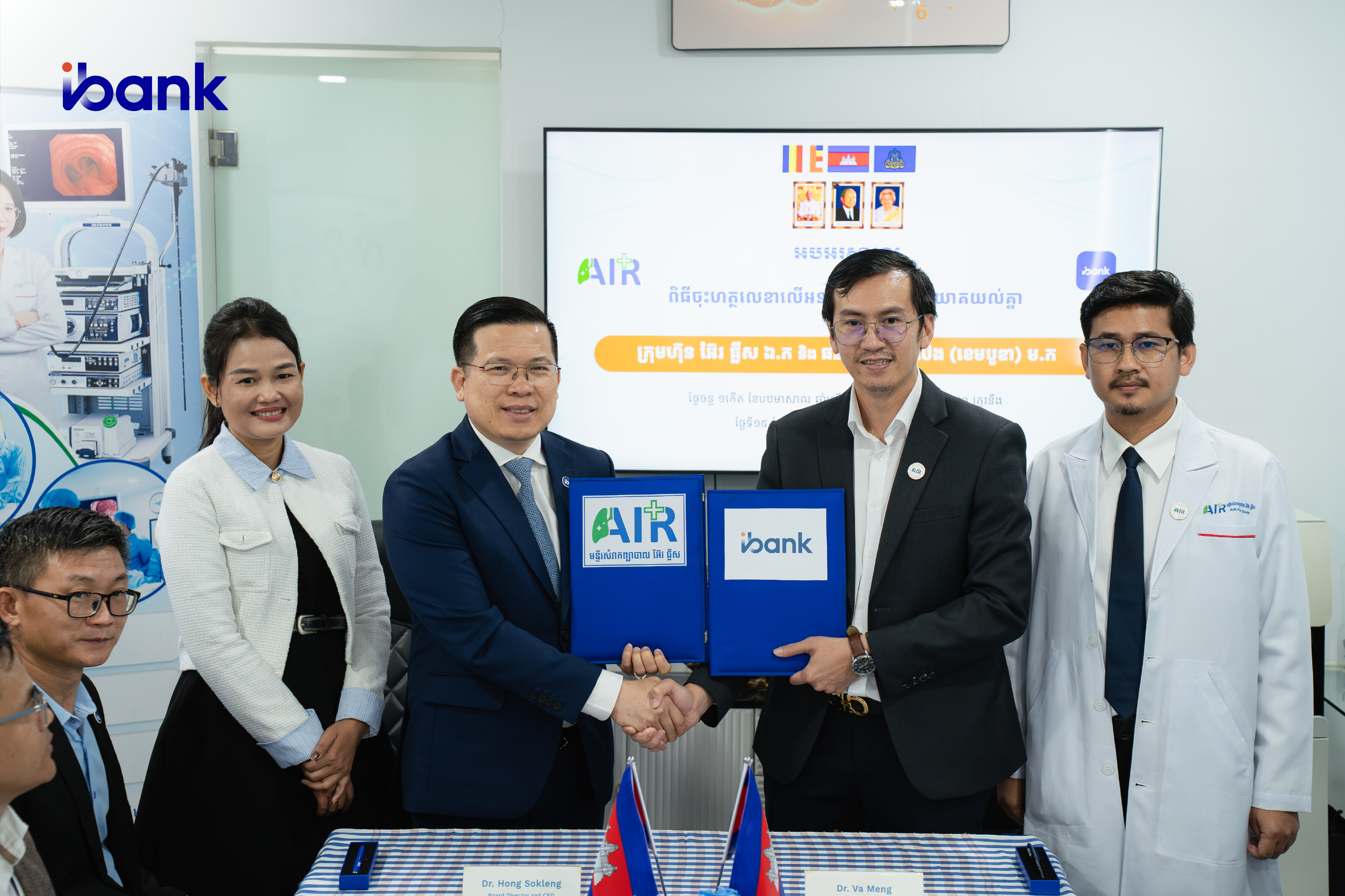 Image: iBank Team and AirPlus Clinic representatives signing a Memorandum of Understanding (MOU)